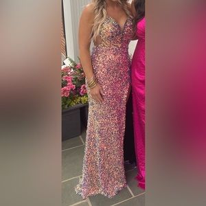 Long formal gown with slit & short train. Open back. Iridescent.